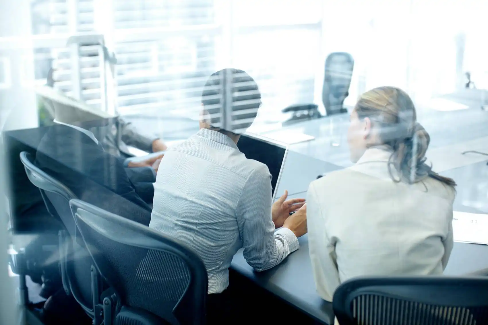 The salesperson is answering the customer's questions